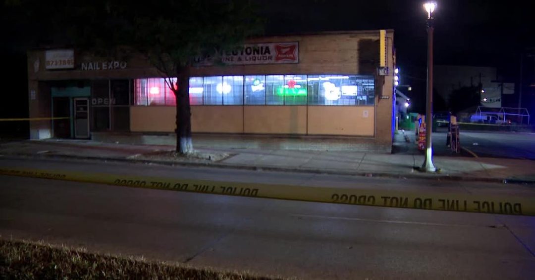 A Milwaukee liquor store near 23rd Street and Capitol Drive behind police tape the night of the Sept. 23, 2024 shooting